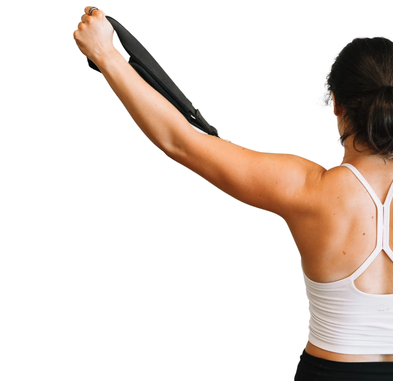 Brett from behind, reaching one arm up with a strap